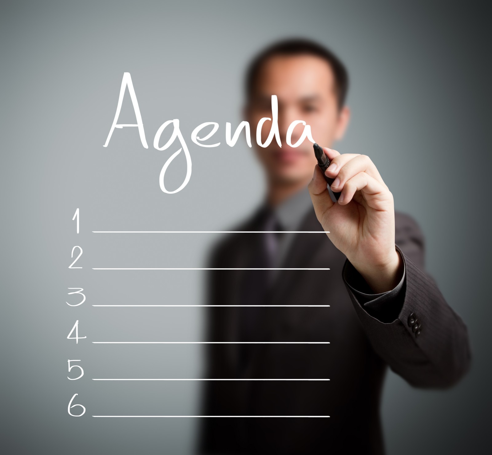 AGENDA-man-wrinting-on-board-shutterstock_116935159-e1398900219499.jpg